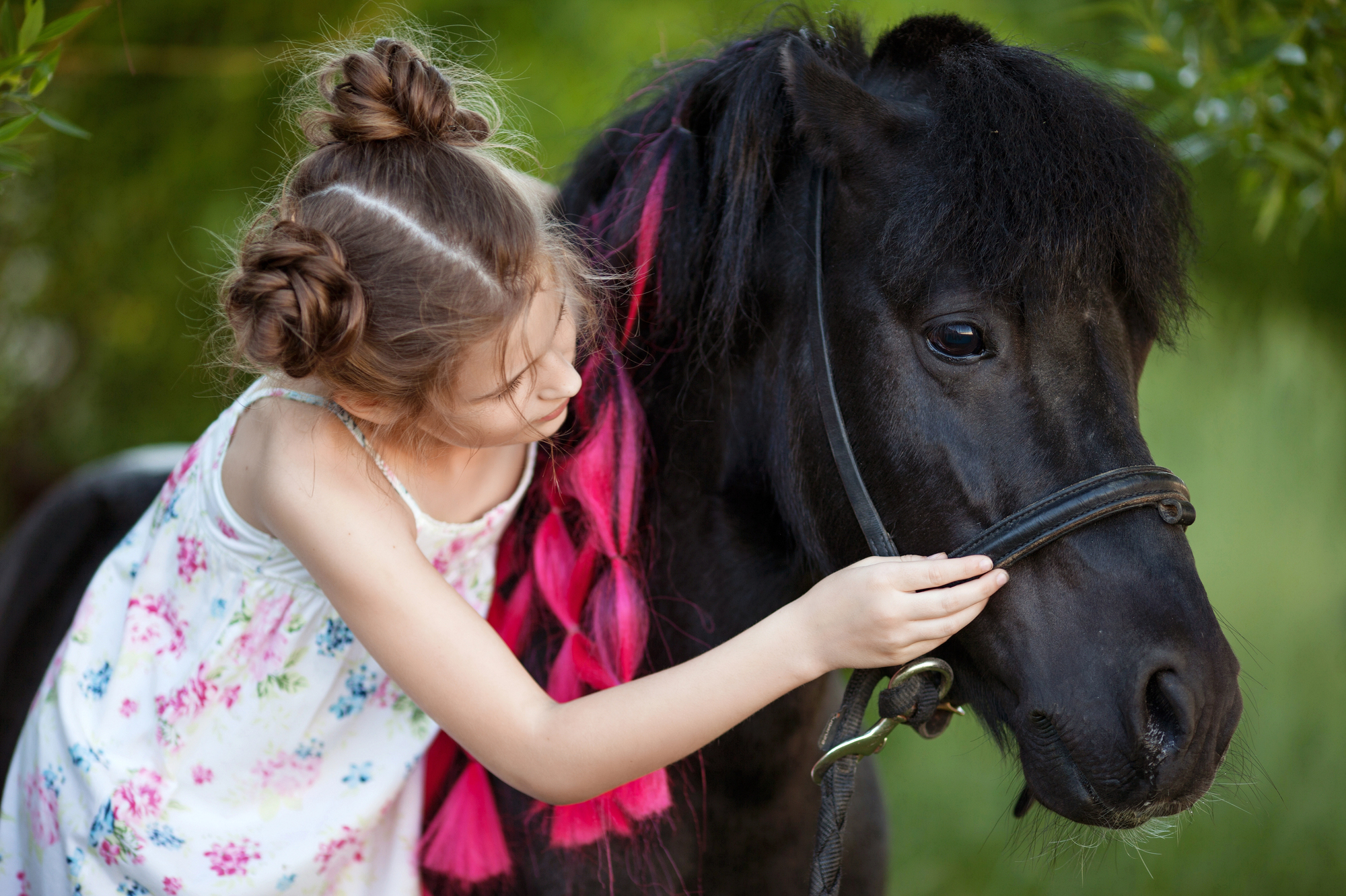 Bambino con Pony